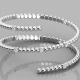 spiral ring with stones